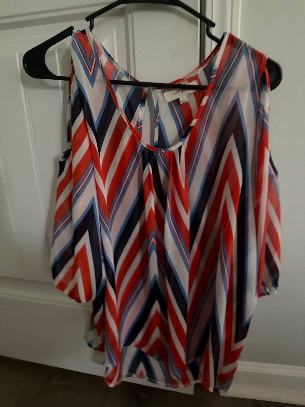 Umgee orange, white; and navy chevron top